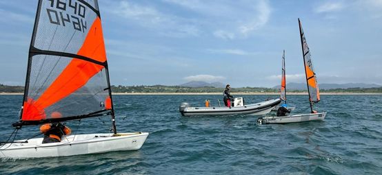 Coach aboard one of RYA CW's new VSRs providing support for junior sailors afloat at Port Dinorwic SC's Dragon Series 2026 event. 